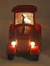 Load image into Gallery viewer, Glitter Lantern Santa In red Tractor
